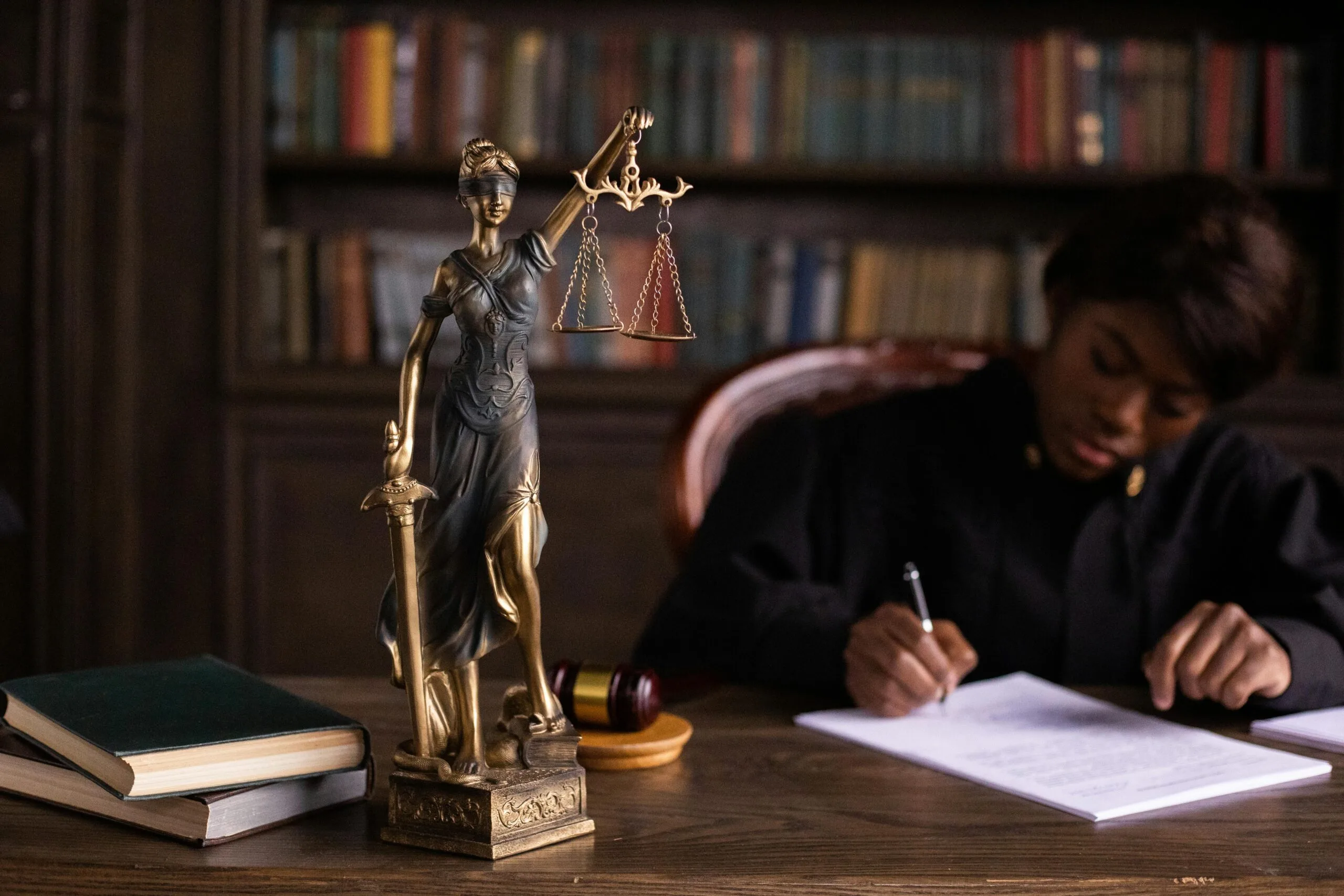 A woman is working in her office