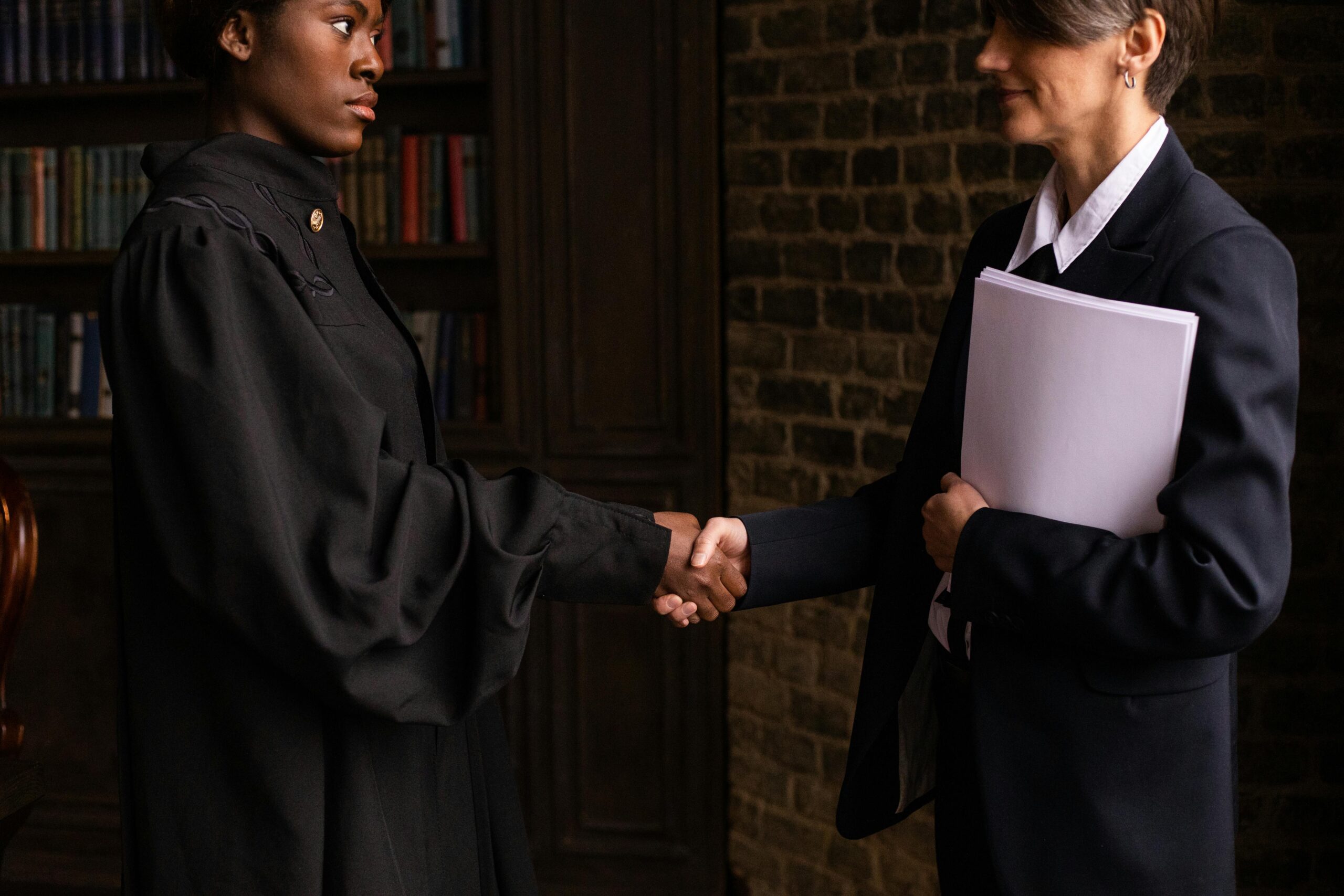 2 persons are greeting each other