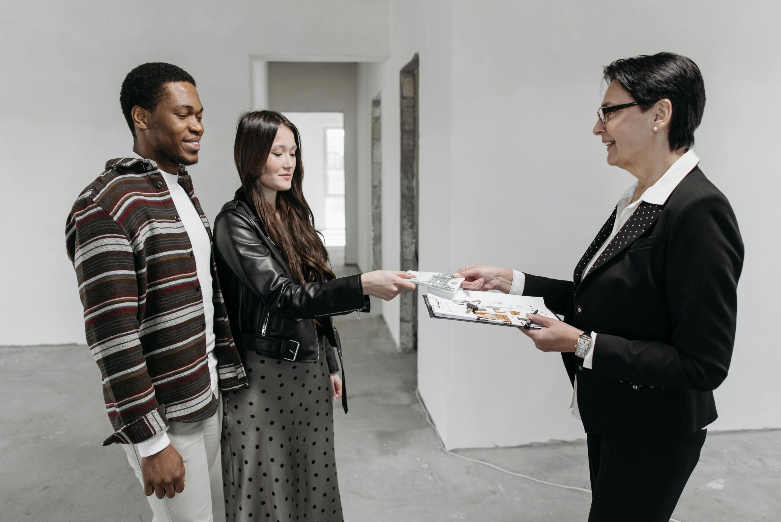 A female lawyer and happy clients